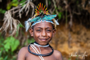 Portrait: Very young Huli Wigman, Paiya Village, Papua New Guinea.