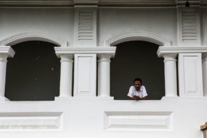Man on a Balcony, Dambulla Cave Temple, Sri Lanka