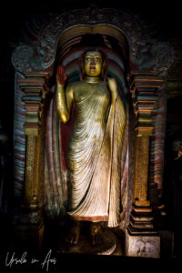 Standing gilded Buddha, Dambulla Cave Temple, Sri Lanka