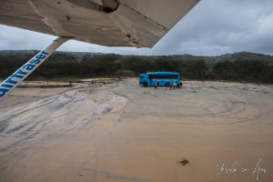 MAN Bus on the Seventy-Five Mile Beach from the air, Fraser Island, Queensland Australia