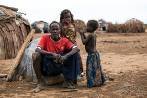 Daasanach man and children, Omo Valley Ethiopia