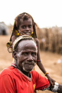 Daasanach man and girl child, Omo Valley Ethiopia