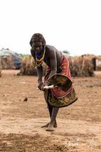 Daasanach woman digging, Omo Valley Ethiopia
