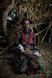 Daasanach Woman with a Goat, Omo Valley Ethiopia