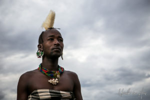 Portrait: Hamar man in a feathered headdress, Omo Valley Ethiopia