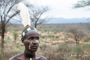 Portrait: Hamar man in a feathered headdress, Omo Valley Ethiopia