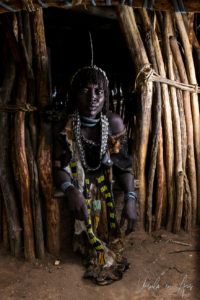 Hamar Woman outside her hut, Omo Valley Ethiopia