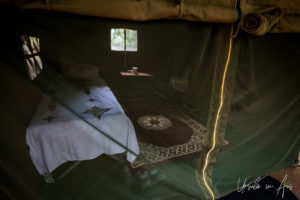 Inside a large tent, outside Dus Village, Ethiopia