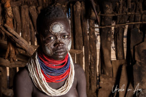 Portrait: Young Kara woman in a hut, Dus Village, SNNPR Ethiopia