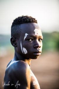 Portrait: Young Kara man in profile, Omo Valley, Ethiopia