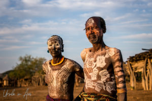 Portrait: Two Kara men in face and body paint, Dus Village, SNNPR Ethiopia