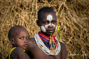 Portrait: Kara mother and child, Dus Village, Omo Valley Ethiopia