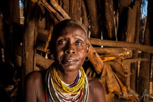 Portrait: Kara woman in a hut, Dus Village, SNNPR Ethiopia