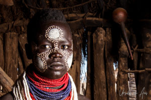 Portrait: Young Kara woman in a hut, Dus Village, SNNPR Ethiopia