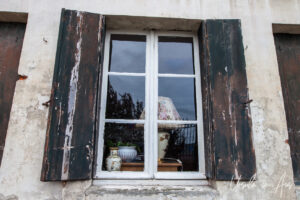 Lamp and vase in a window, Honfleur France