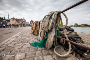 Nets and ropes hanging over a rail, Honfleur France