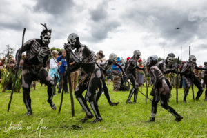 Skeleton men leaping around, Mt Hagen Papua New Guinea