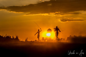 Water tower silhouetted by sunset on the Omo River, Ethiopia