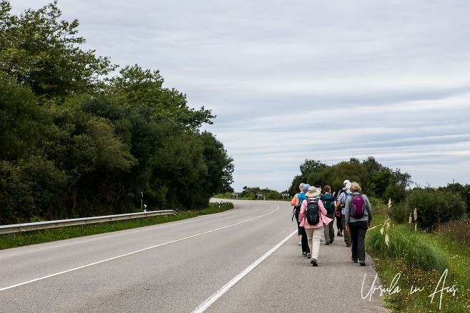 Walkers on the Carretera del Cantábrico, Asturias Spain