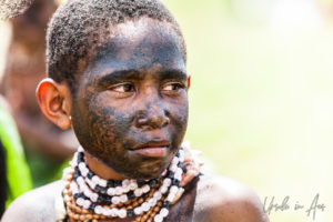 Portrait: Child from the Ekawest Culture Group, Mt Hagen Cultural Show, PNG