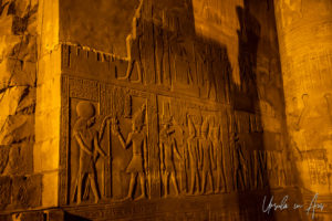 Carved walls and columns, Kom Ombo Temple after dark, Egypt