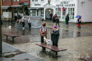 Tourists o the Wet Waterfront, Bryggen, Norway