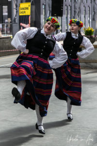 Two female Norwegian folk dancers, Bergen train station
