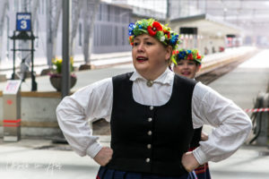 Portrait of a female Norwegian folk dancer, Bergen train station