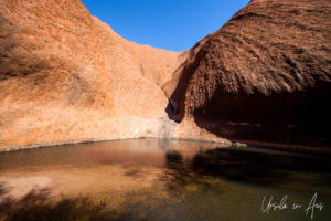 Still waters of Mutitjulu Waterhole, Uluru NT Australia