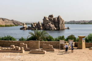 Tourists in the courtyard of the Temples of Philae, Agilkia Island, Egypt