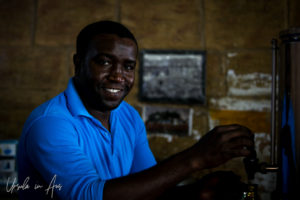 Portrait: Nubian man making coffee, Agilkia Island, Egypt