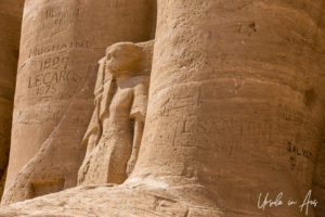 Mut-Tuy and graffiti on a Calossi leg, the Great Temple, Abu Simbel Egypt.