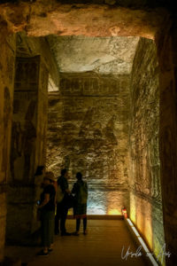 Visitors in a dark corridor, Great Temple, Abu Simbel, Egypt