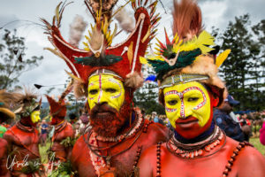 Man and young woman from the Kerapia Boys Hela Wigman, Mt Hagen Festival, Papua New Guinea