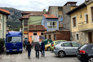 Walkers in the narrow back streets of Panes, Asturias Spain.