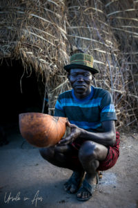 Portrait: Nyangatom man sitting, Omo Valley, Ethiopia