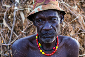 Portrait: Nyangatom old man with ritual scars, Omo Valley, Ethiopia