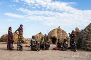 Women and children in a Nyangatom kraal, Omo Valley Ethiopia