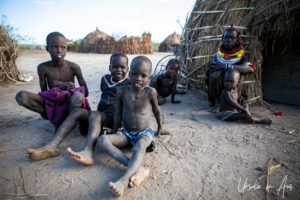 Nyangatom children in a courtyard, Omo Valley Ethiopia