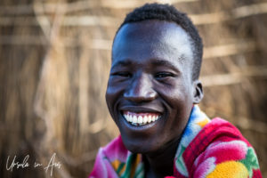 Portrait: Nyangatom man smiling, Omo Valley, Ethiopia
