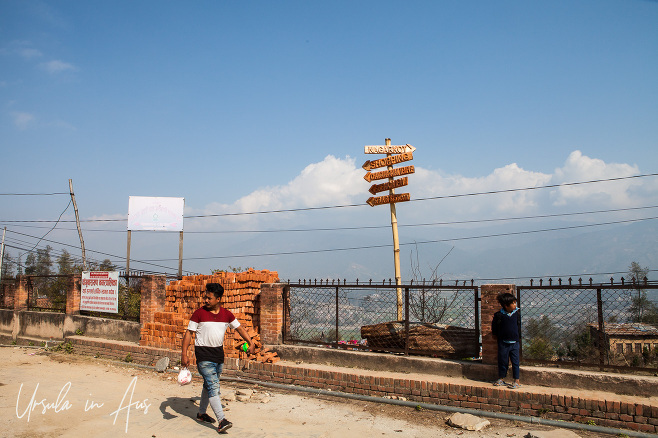 Man on a walkway outside Changunarayan Temple complex, Nepal