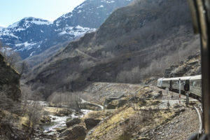 Flåmsbana train approacing a tunnel, Norway
