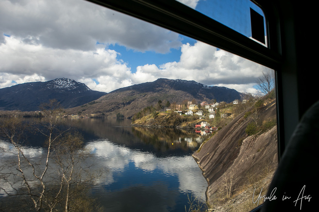 View over a colourful town on the Vosso River from the Bergensbanen, Norway
