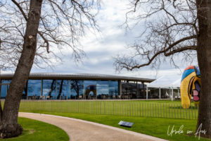 Sculptures on the lawn looking back to the Pt Leo restaurant, Victoria, Australia