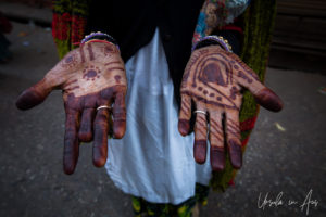 Henna-decorated hands, Haridwar India