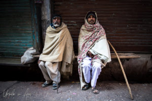 Indian men in woolen hats and blankets, Haridwar
