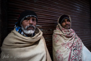 Portrait: Indian men in woolen hats and blankets, Haridwar