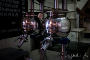 Two shiny lassi machines, Haridwar India