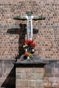 A silver cross inside the Santo Domingo del Cusco, Peru