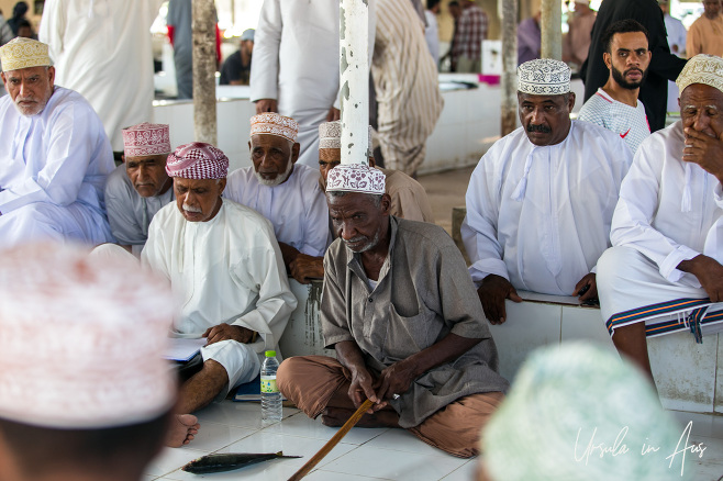 Man at the auction table, Barka Fish Market, Oman